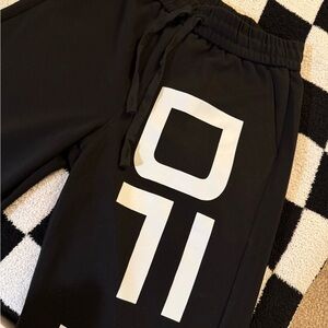 Kids Black Jogger Pants with Bold Print